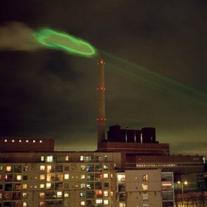 Photo of vapor emissions from the Salmisaari coal burning power plant illuminated with a high power green laser animation.