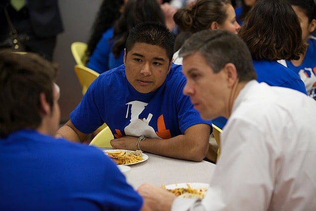 Former U.S. Secretary of Education Arne Duncan with Reality Changers students. 