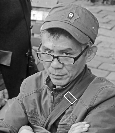 Che Guevara image on man's cap, Shanghai, 2013. Photo: Matthew Gutmann.